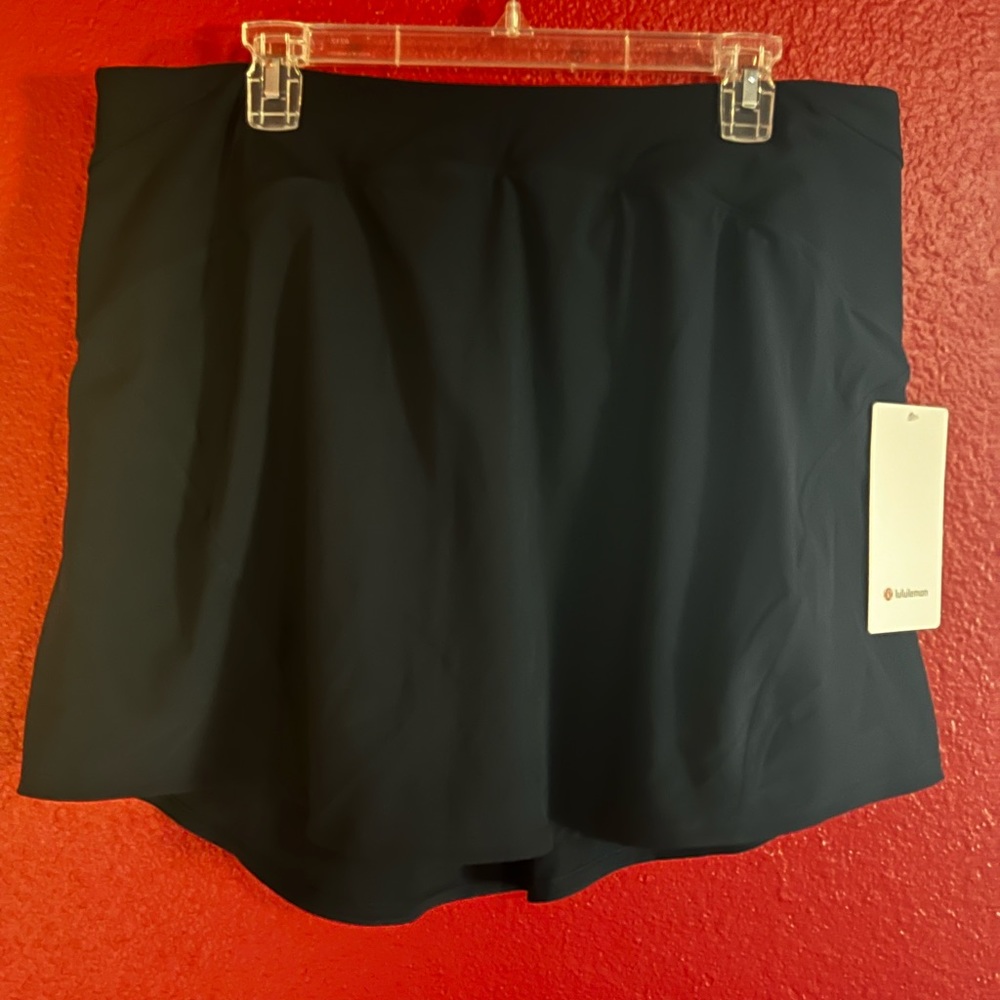 Lululemon Essential HR Run Skort, Navy with deep pockets in each leg, 14